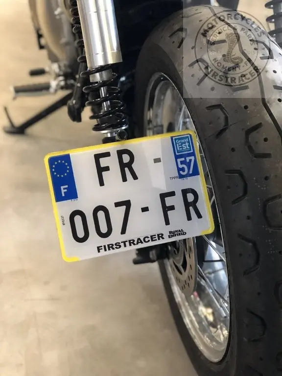 Porte plaque latéral + éclairage de plaque Triumph Firstracer